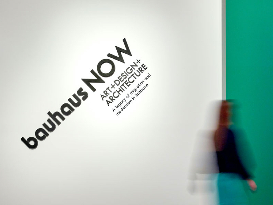 Lady walking into the Bauhaus Now exhibition