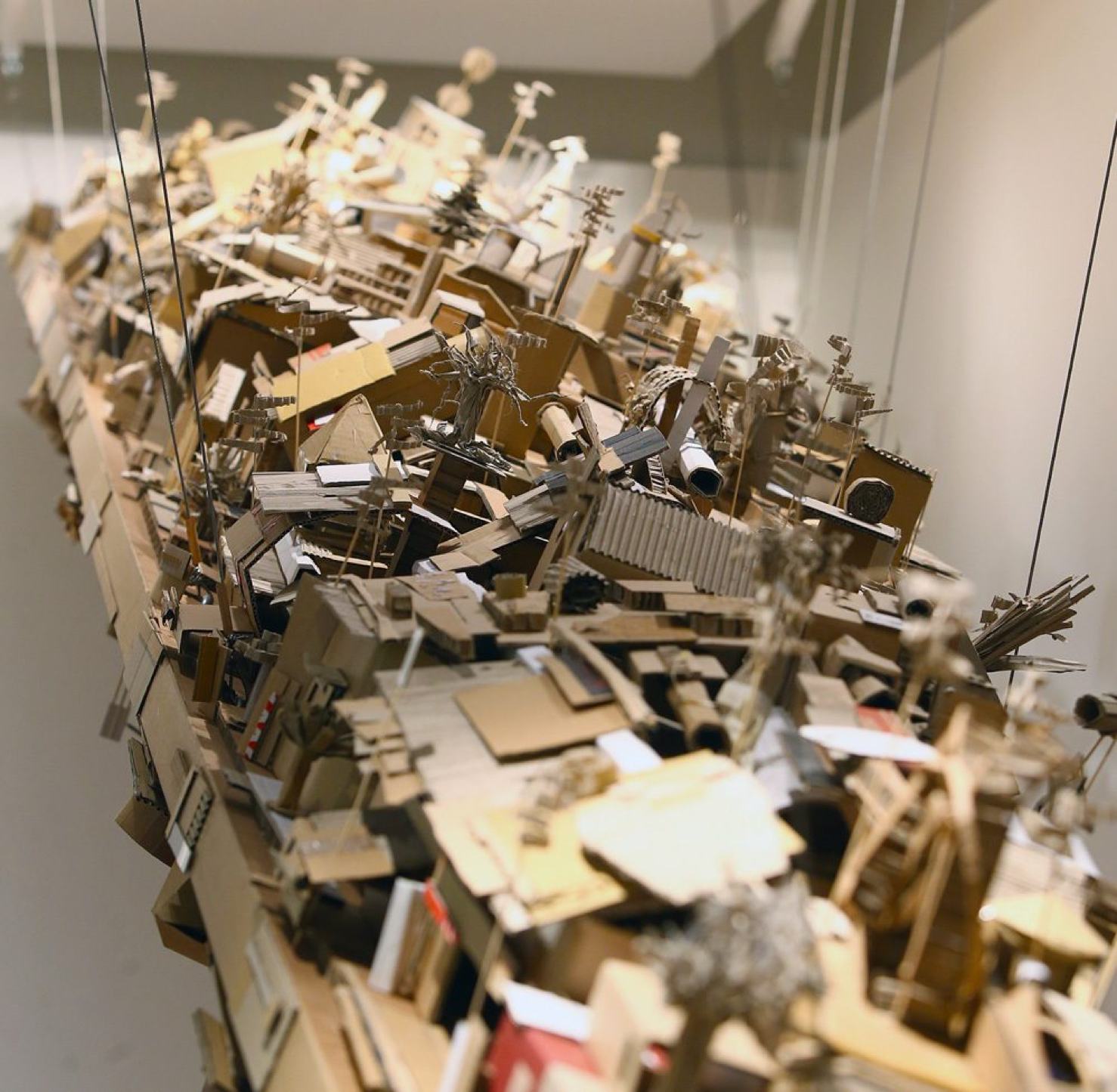 Large cardboard artwork constructed with packing tape