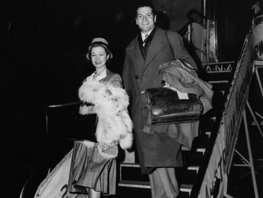 Sir Laurence and Lady Olivier Disembarking from the plant Archerfield Aerodrome. June 1948. Courtesy State Library Queensland.