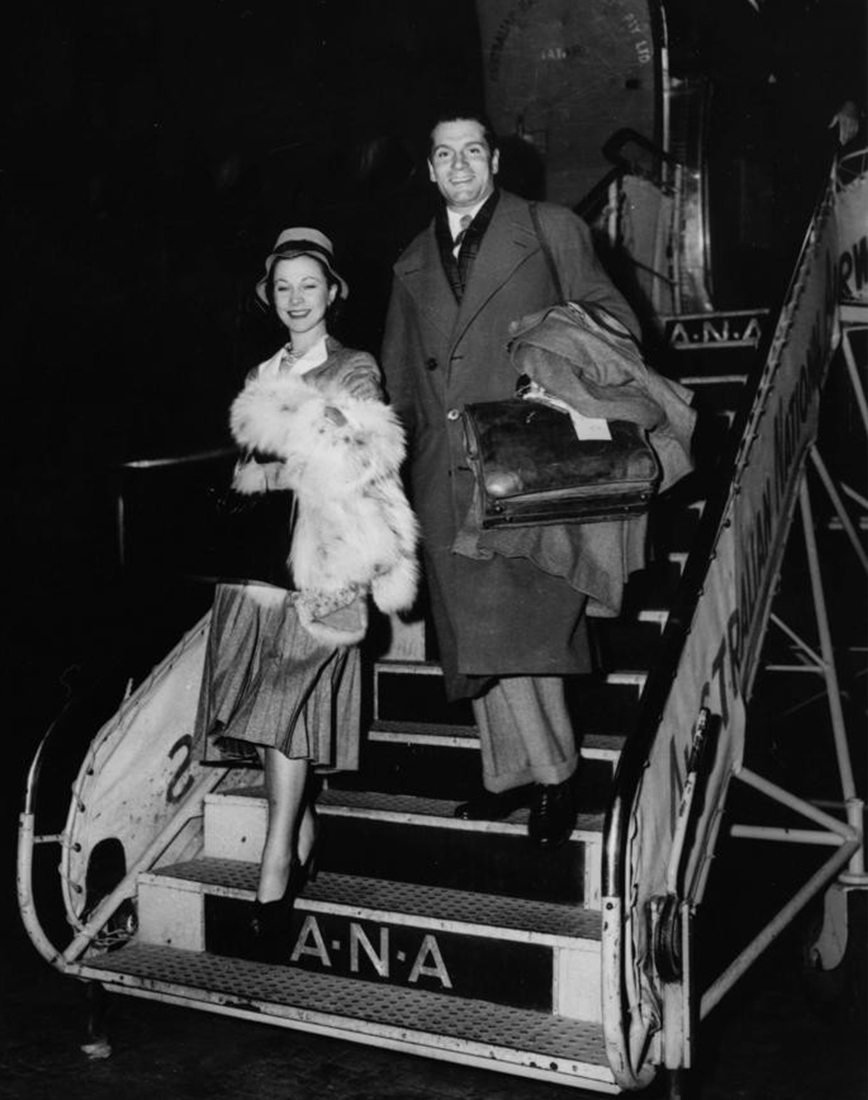 Sir Laurence and Lady Olivier Disembarking from the plant Archerfield Aerodrome. June 1948. Courtesy State Library Queensland.