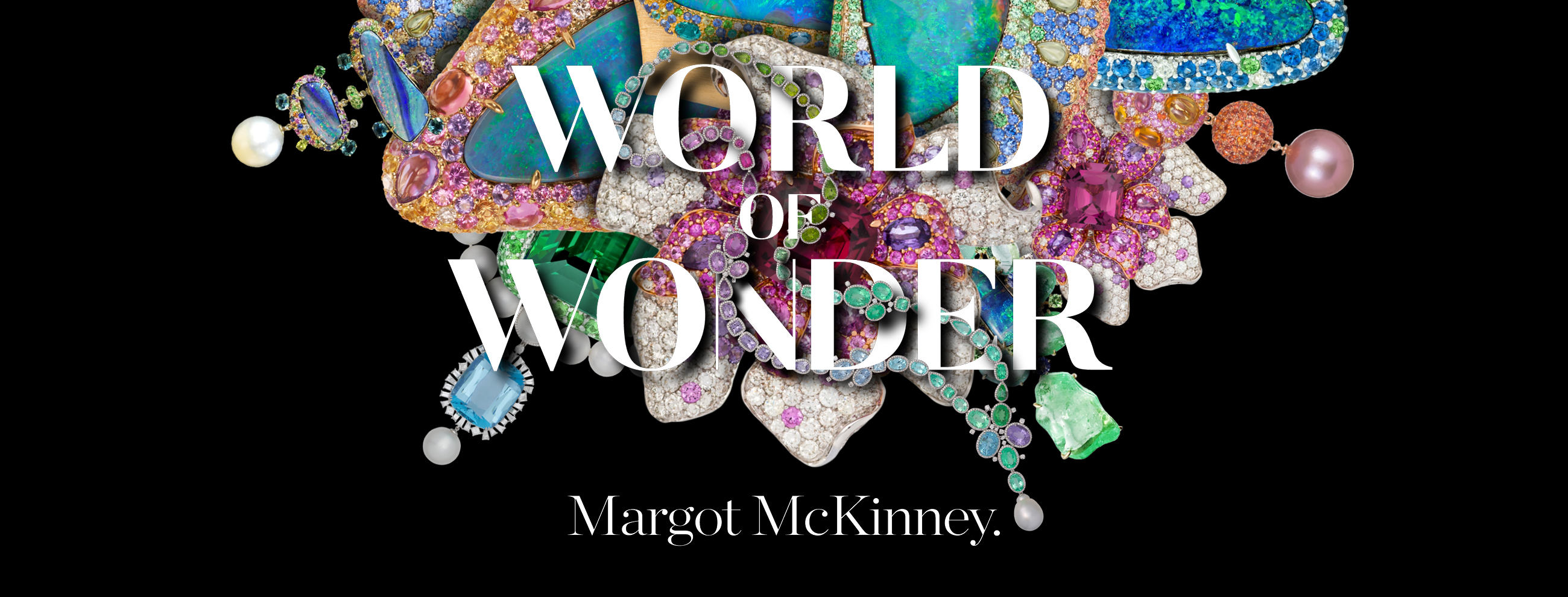 Collection of brightly coloured jewels against a black background. Text in front of jewels, 