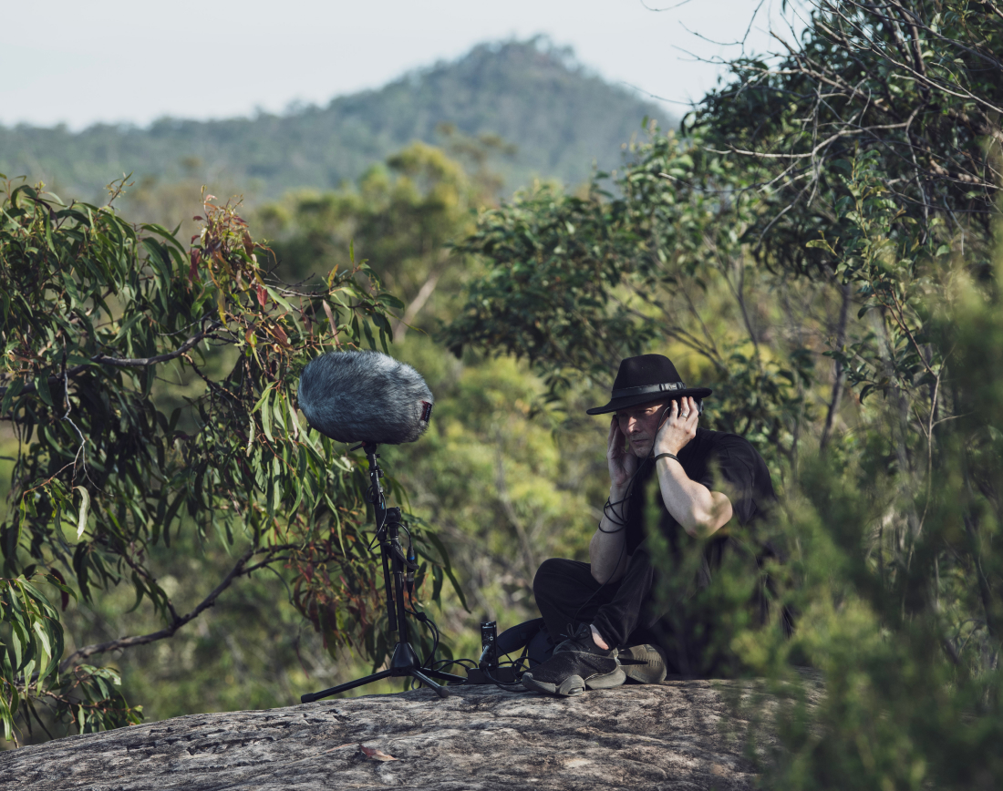 Artist Lawrence English recording sounds in the Australian bush