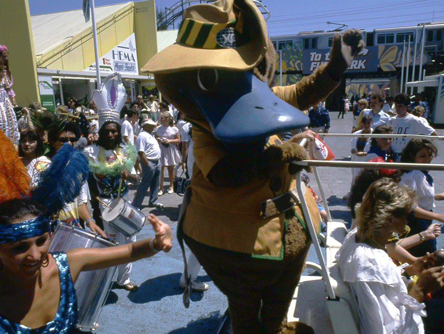 An archival photo of Expo Oz waving at a crowd.