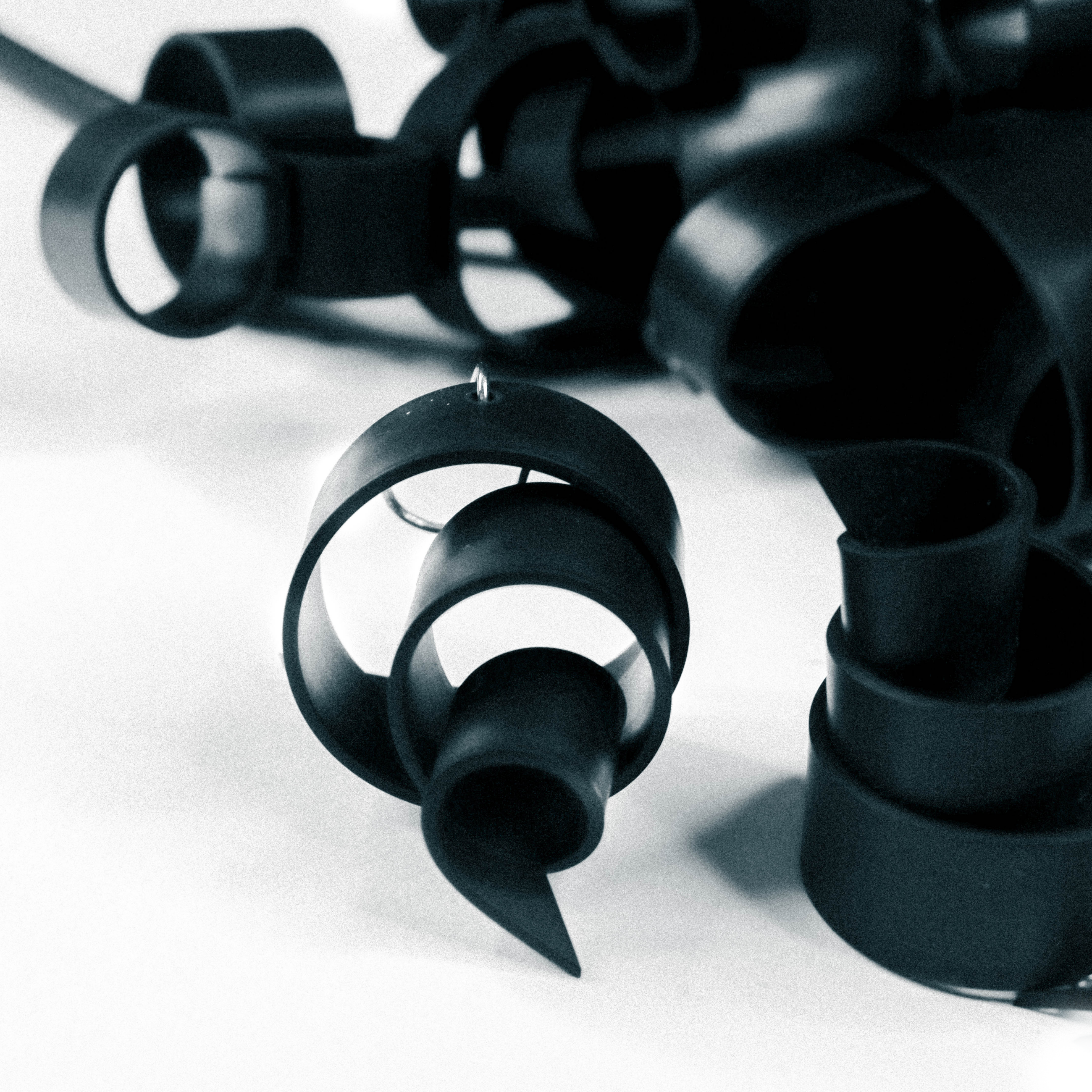MIKAs spiral rubber earring