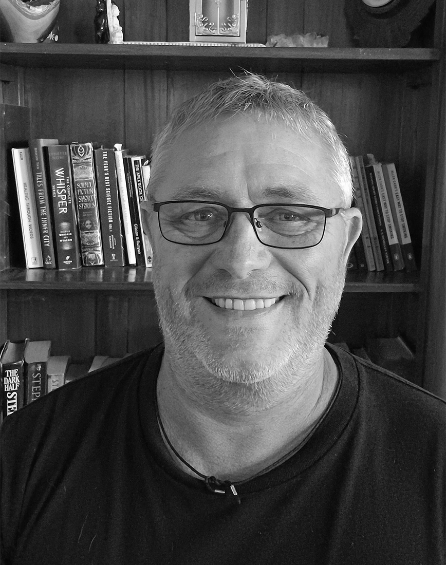 A selfie of a man smiling.