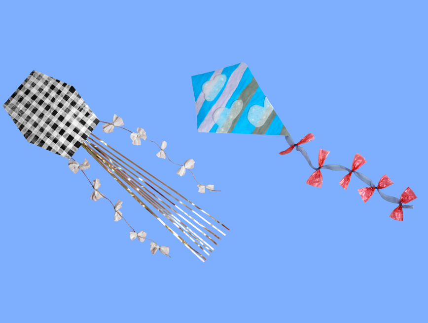 Two craft kites against purple background.