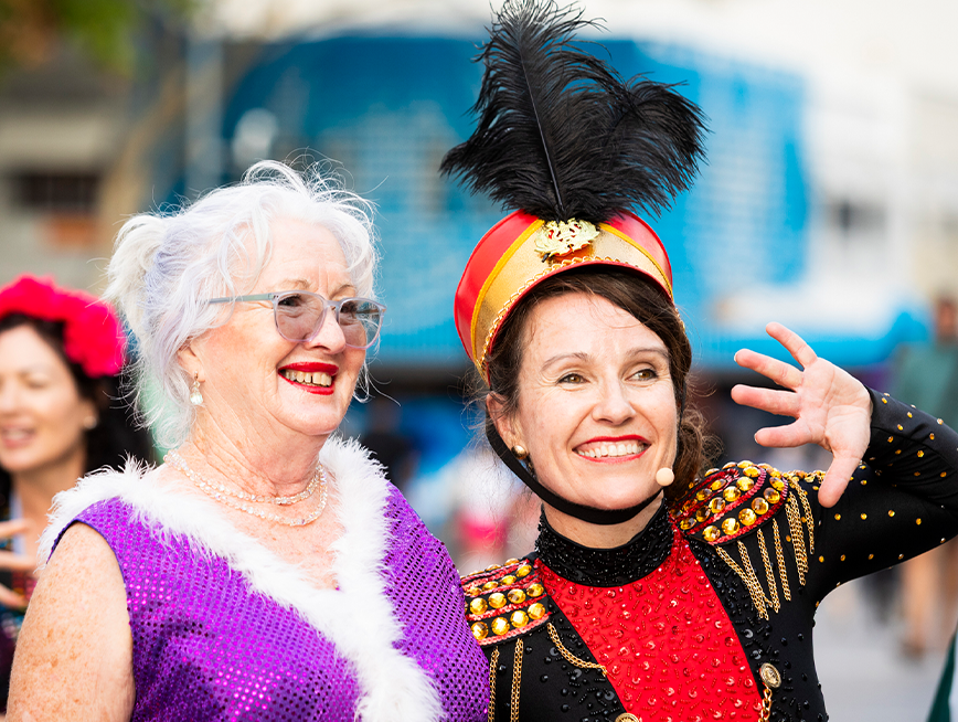 Two women in show biz clothes.