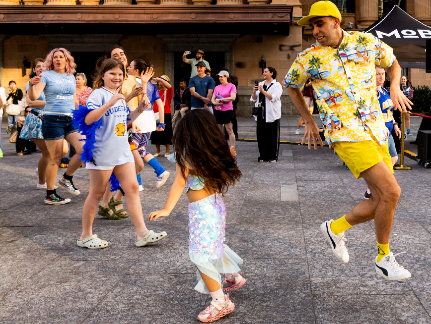 A group of people dancing.