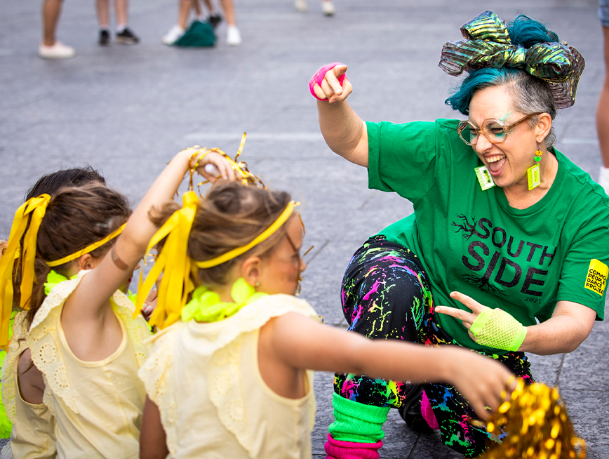 A group of people dancing.