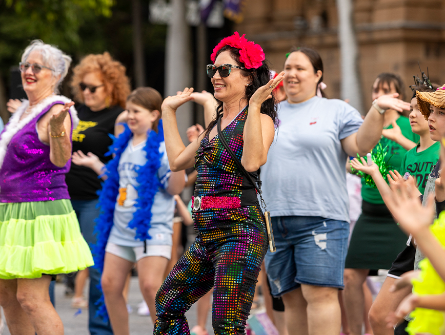 A group of people dancing.