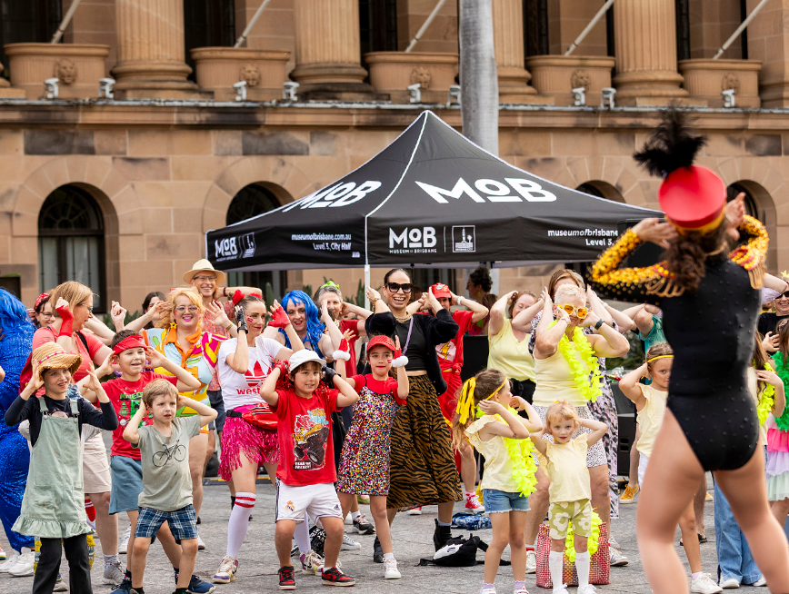A group of people dancing.