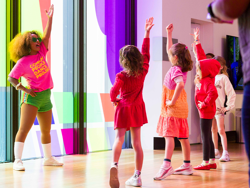 A group of people dancing.