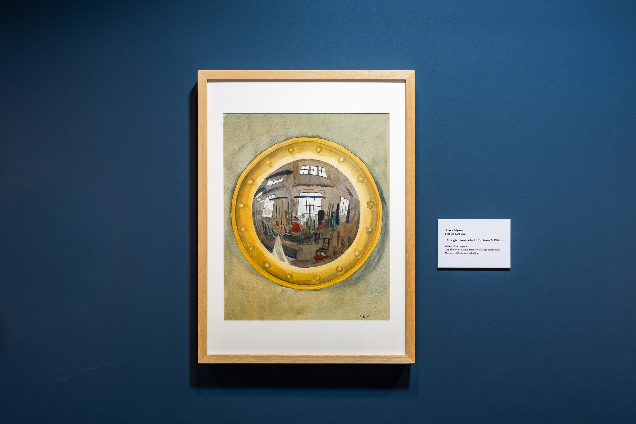 Watercolour painting of a porthole.