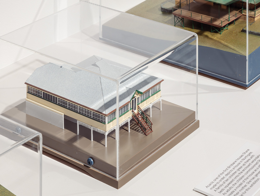 Queenslanders model house in display case.