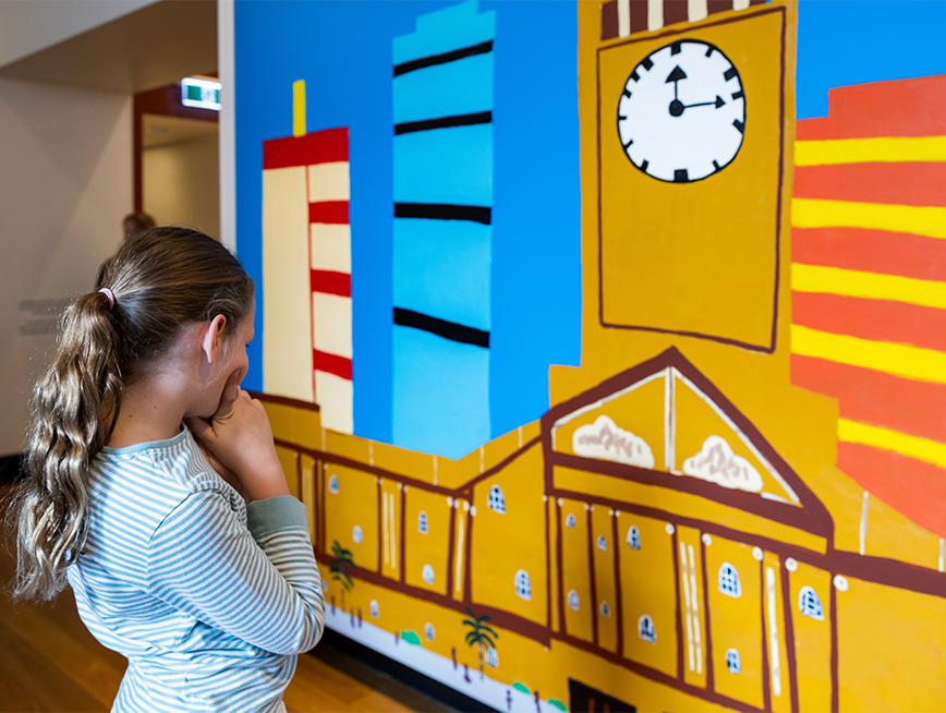 Mural by Martin Edge, painted Brisbane cityscape, and Storybridge. CityCat is seen travelling on the Brisbane River.