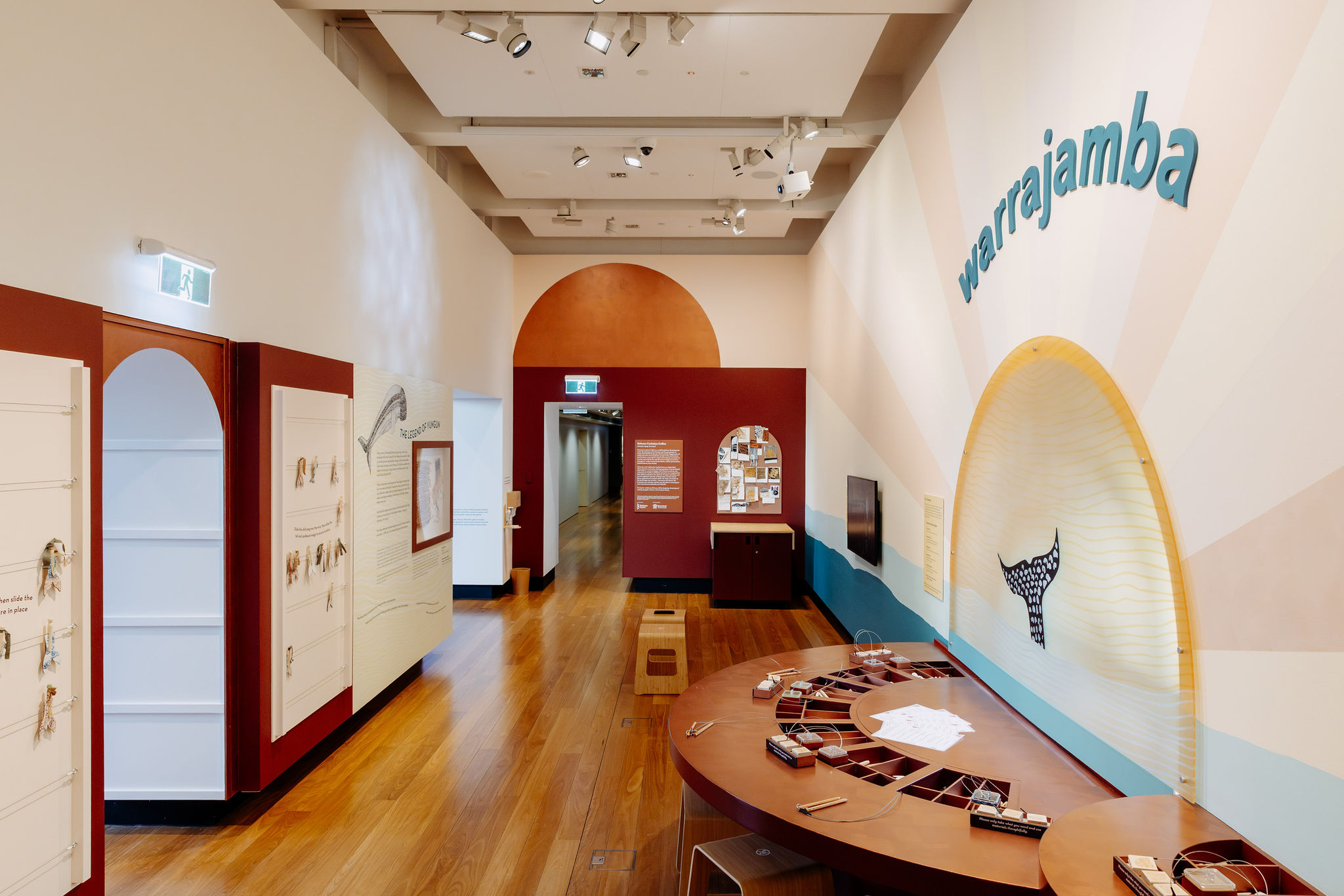 A gallery space with activities and interactive wall.