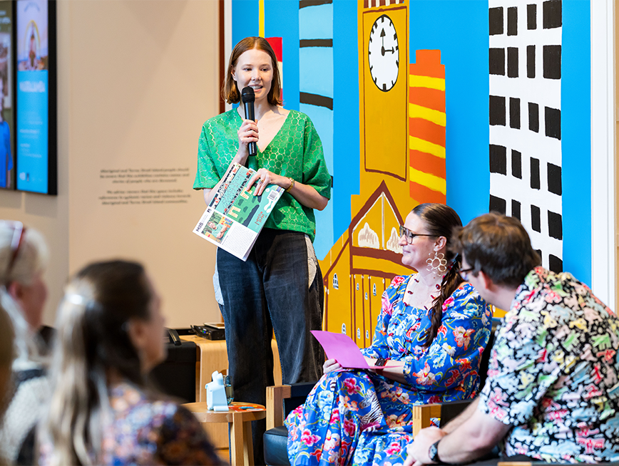 Assistant Curator Gabrielle addressing the audience.