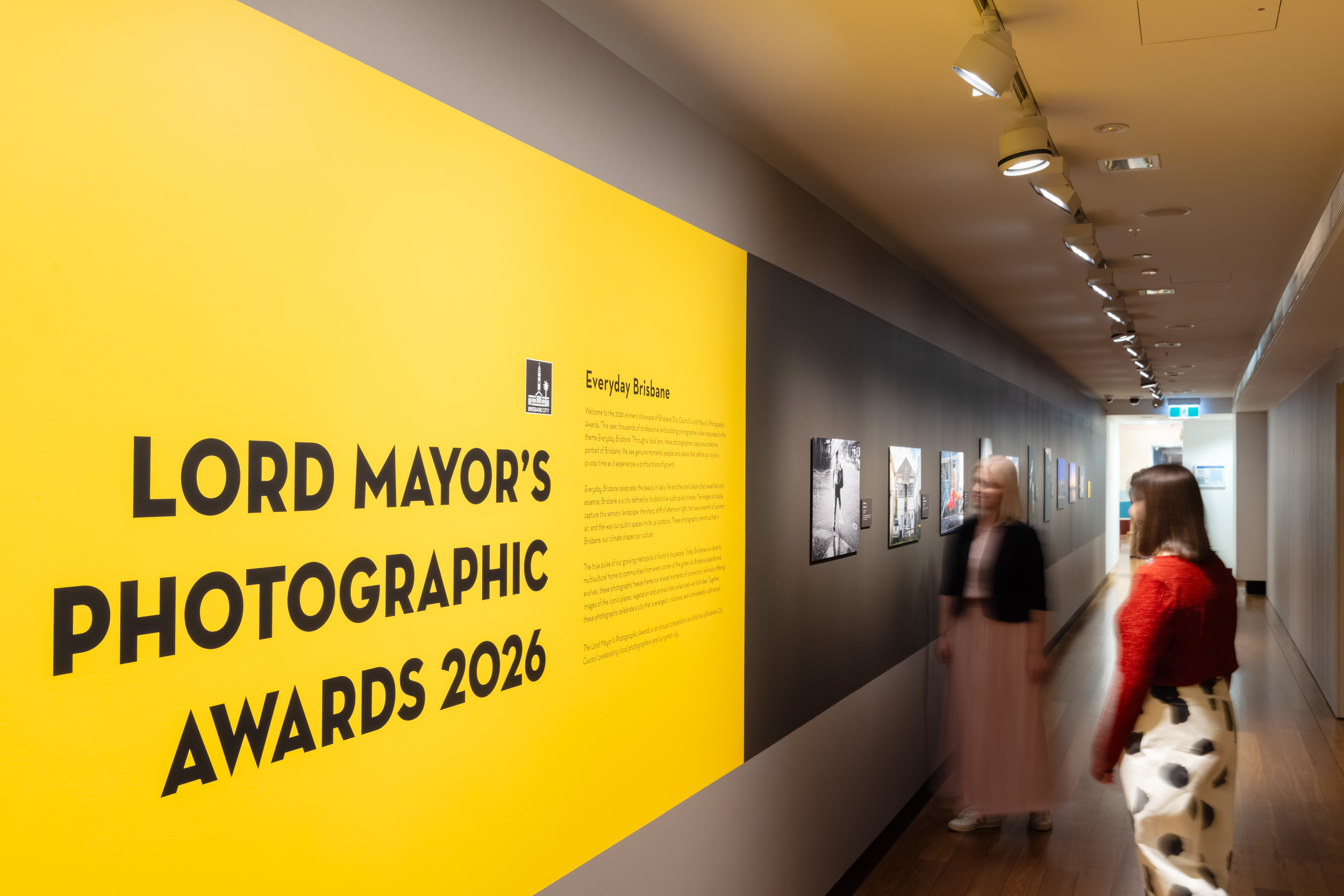 Visitor viewing photographic works at the Lord Mayor's Photographic Awards 2026.