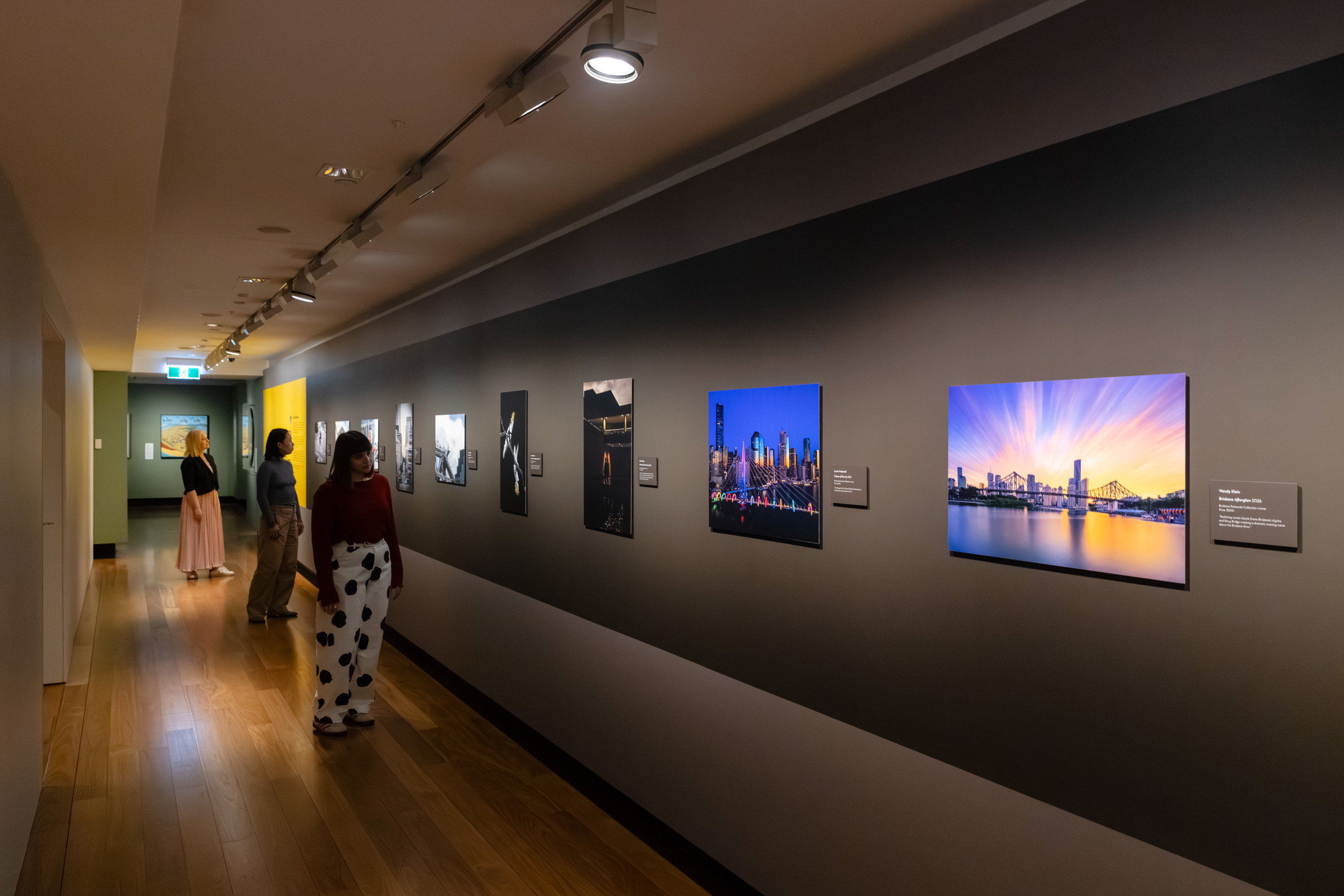 Visitor viewing photographic works at the Lord Mayor's Photographic Awards 2026.
