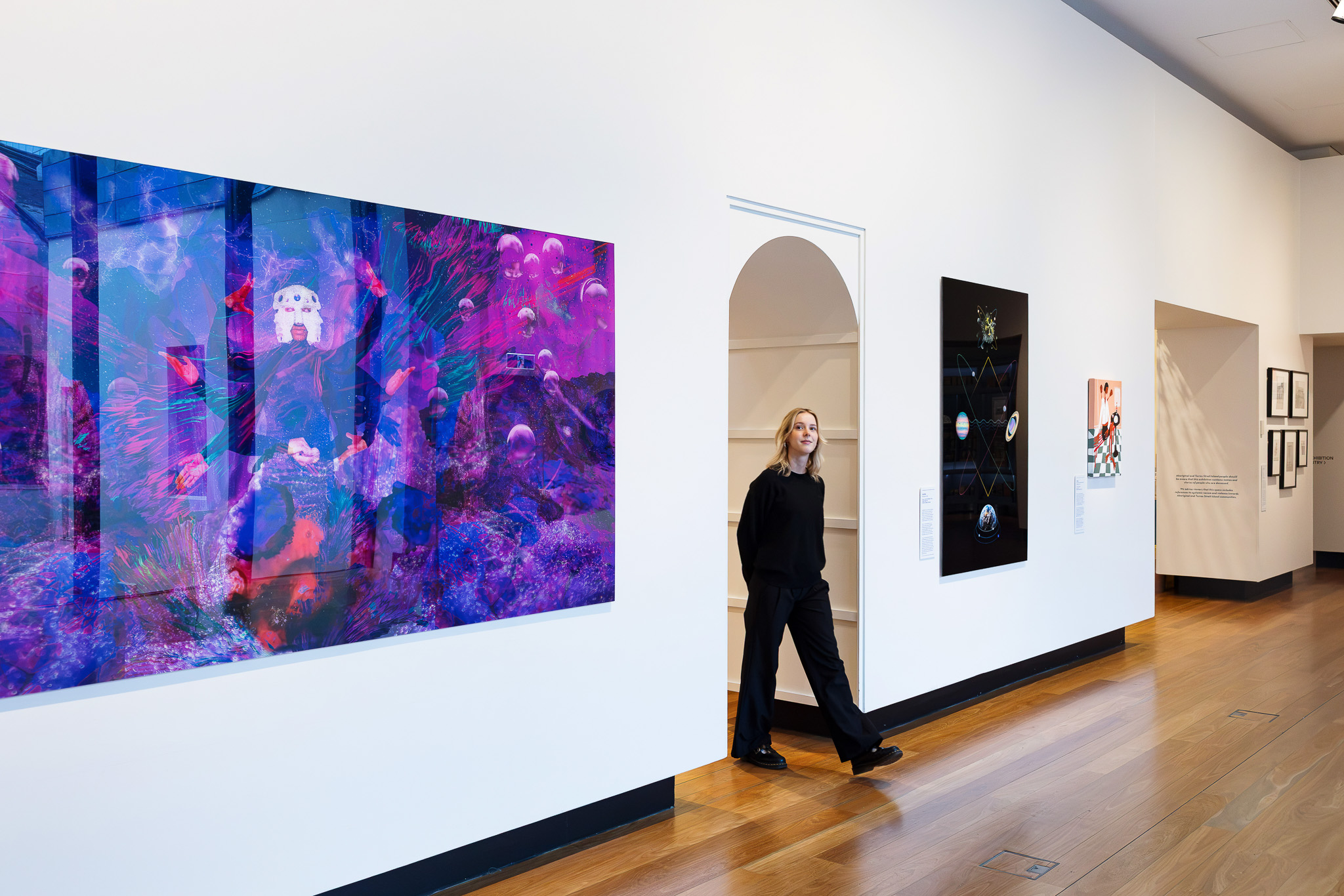 Visitors at In Residence exhibition.