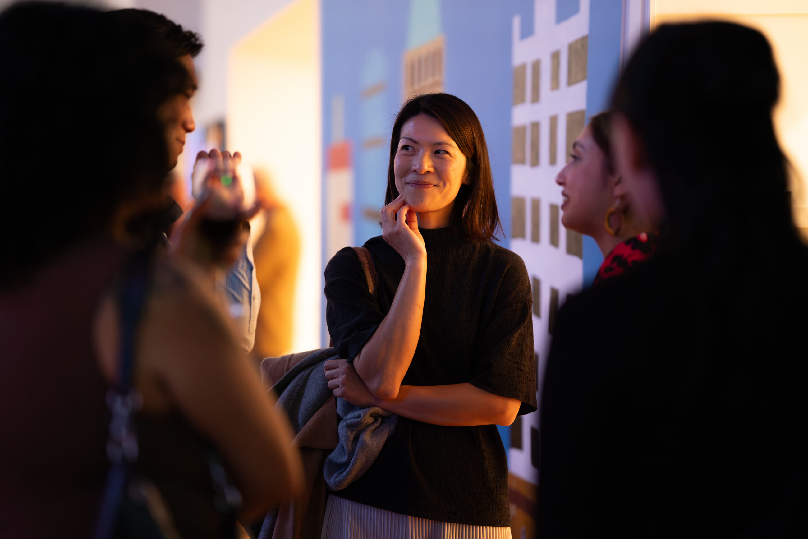 A group of people chatting at the Museum.